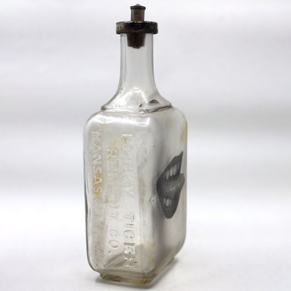 
                  
                    Babs Hand-printed Ladies Mouth, 'Lick It' Vintage Bottle Art
                  
                