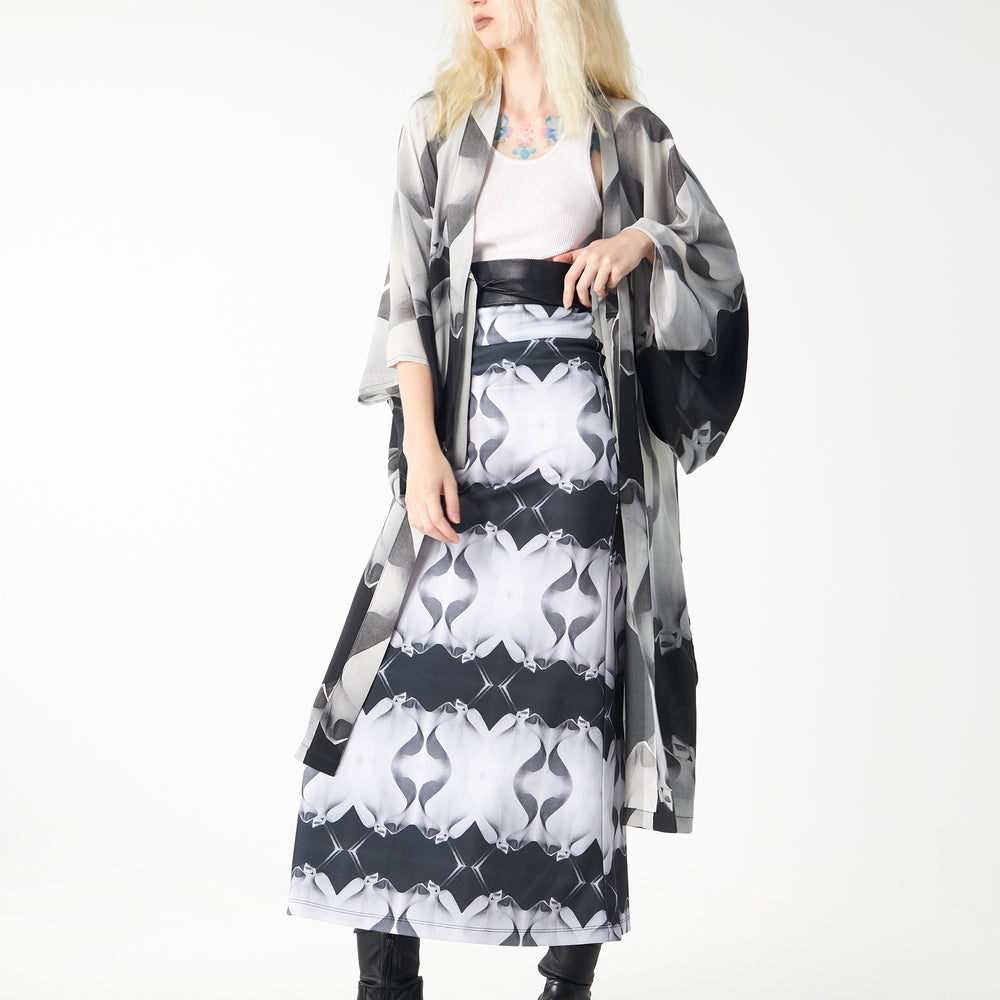
                  
                    Babs Body-Hugging Midi Skirt - Black/White Stone Man Print Design
                  
                
