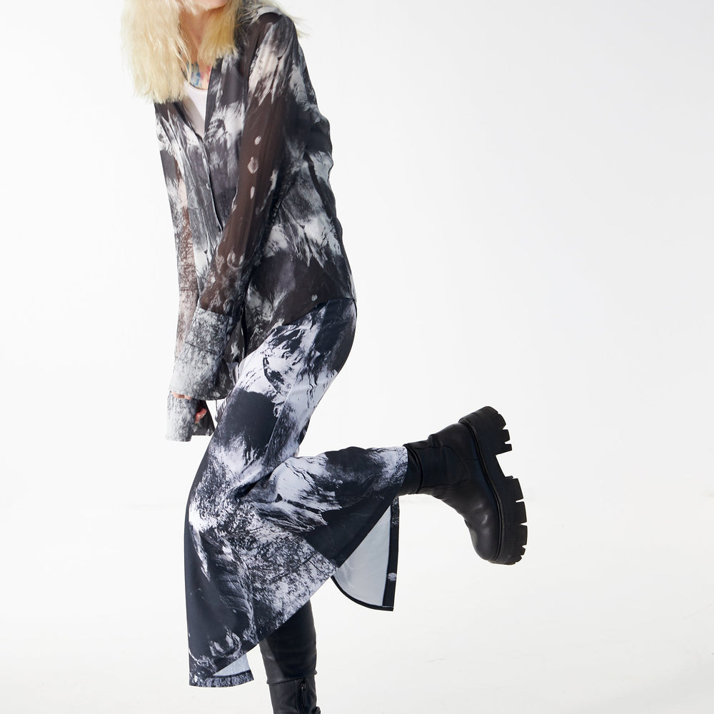 
                  
                    Babs Body-hugging Midi Skirt - Black/White Nature Print Design
                  
                